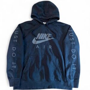 All black Nike hoodie with "Just Do It" logo